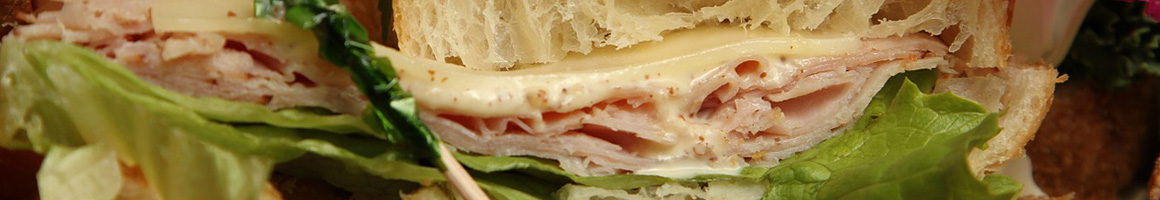 Eating Sandwich Salad Bakery at Picnic Cafe and Dessertery restaurant in Dahlonega, GA.